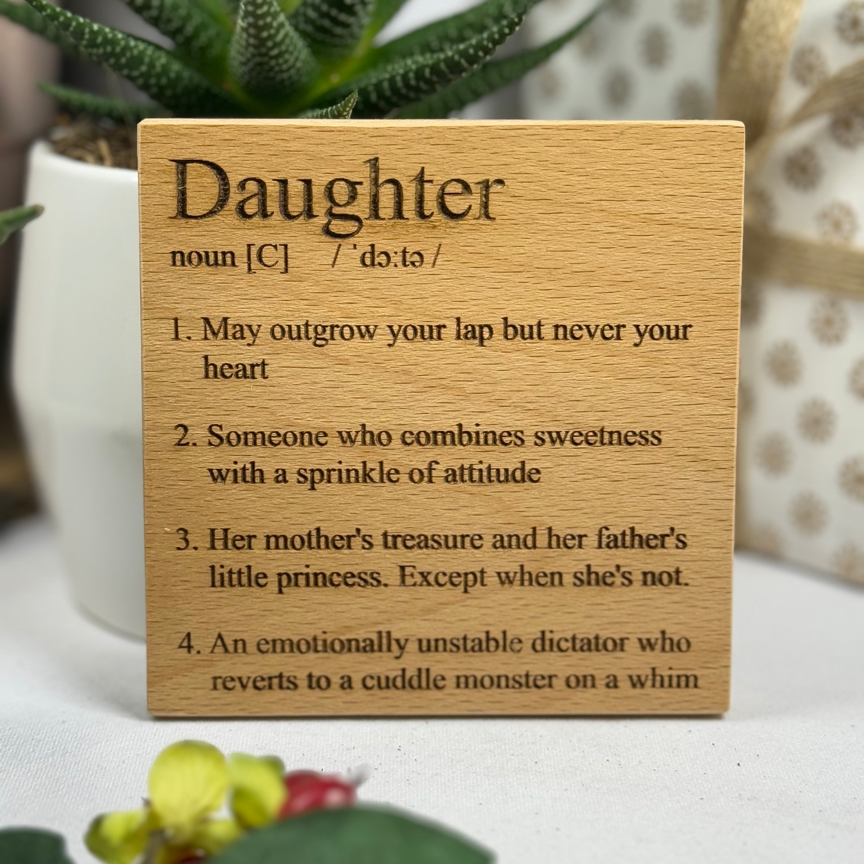 Wooden coaster - definition - daughter