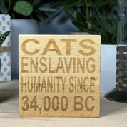 Wooden coaster - cats enslaving humanity since 34000 BC