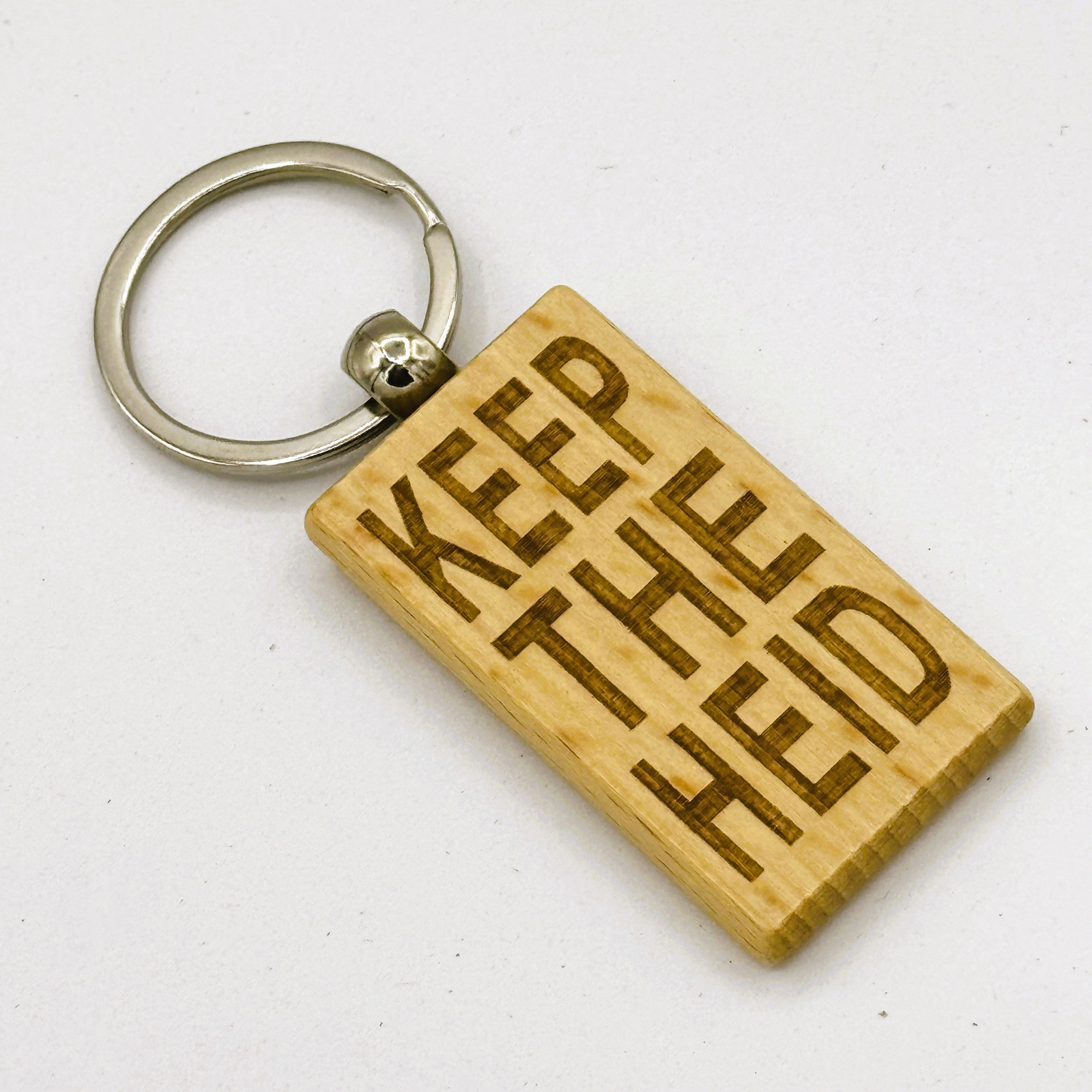 Wooden keyring laser engraved with Scottish dialect keep the heid
