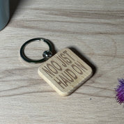 Wooden keyring - noo jist haud on
