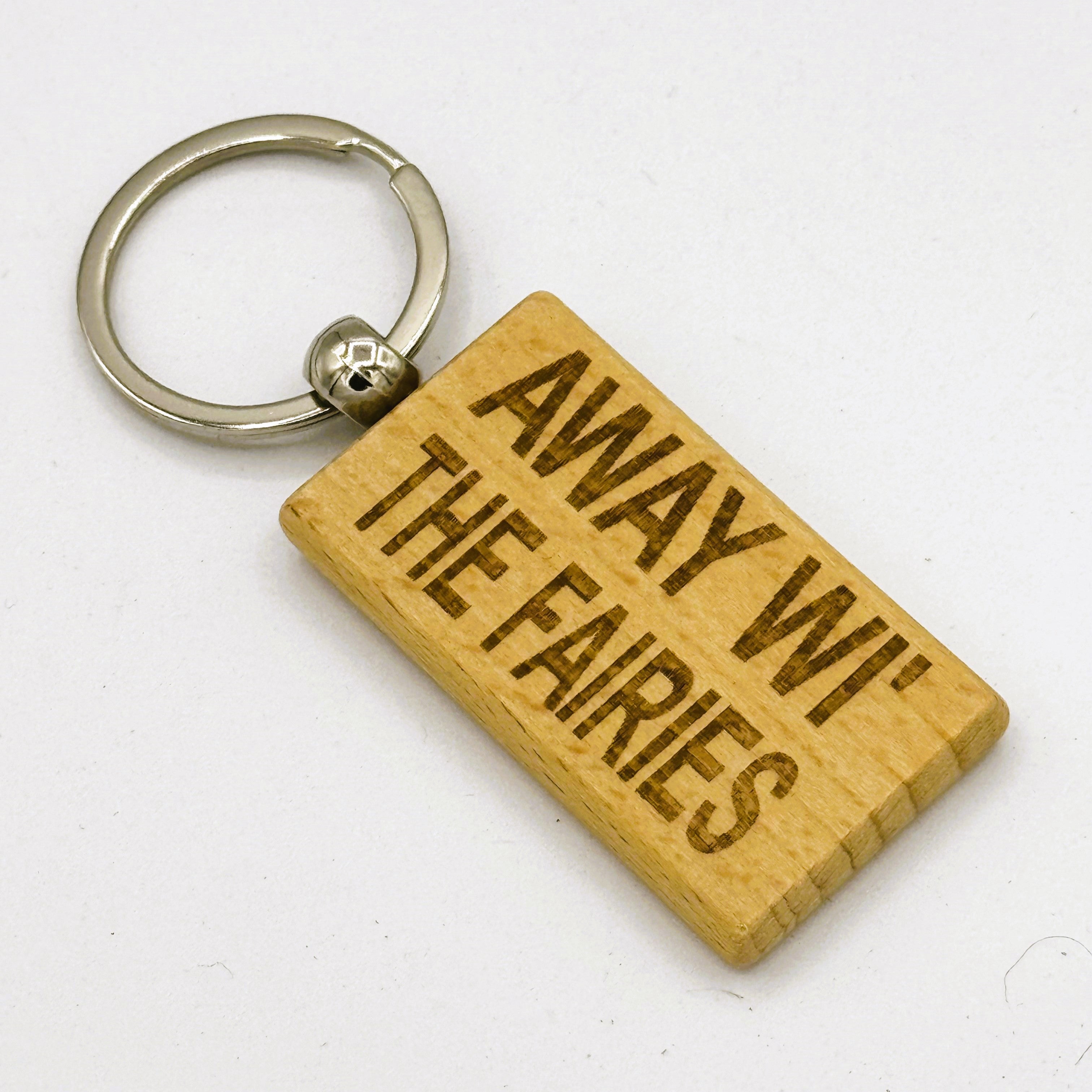 Wooden keyring laser engraved with Scottish dialect away wi the fairies