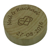 Wooden fridge magnet bottle opener laser engraved with the couple's name and wedding date, plus a heart/infinity symbol
