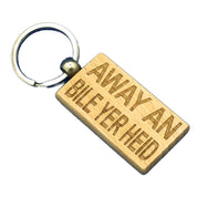 Wooden keyring laser engraved with Scottish dialect - away an' bile yer heid