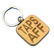 Wooden keyring laser engraved with Scottish dialect - taps aff
