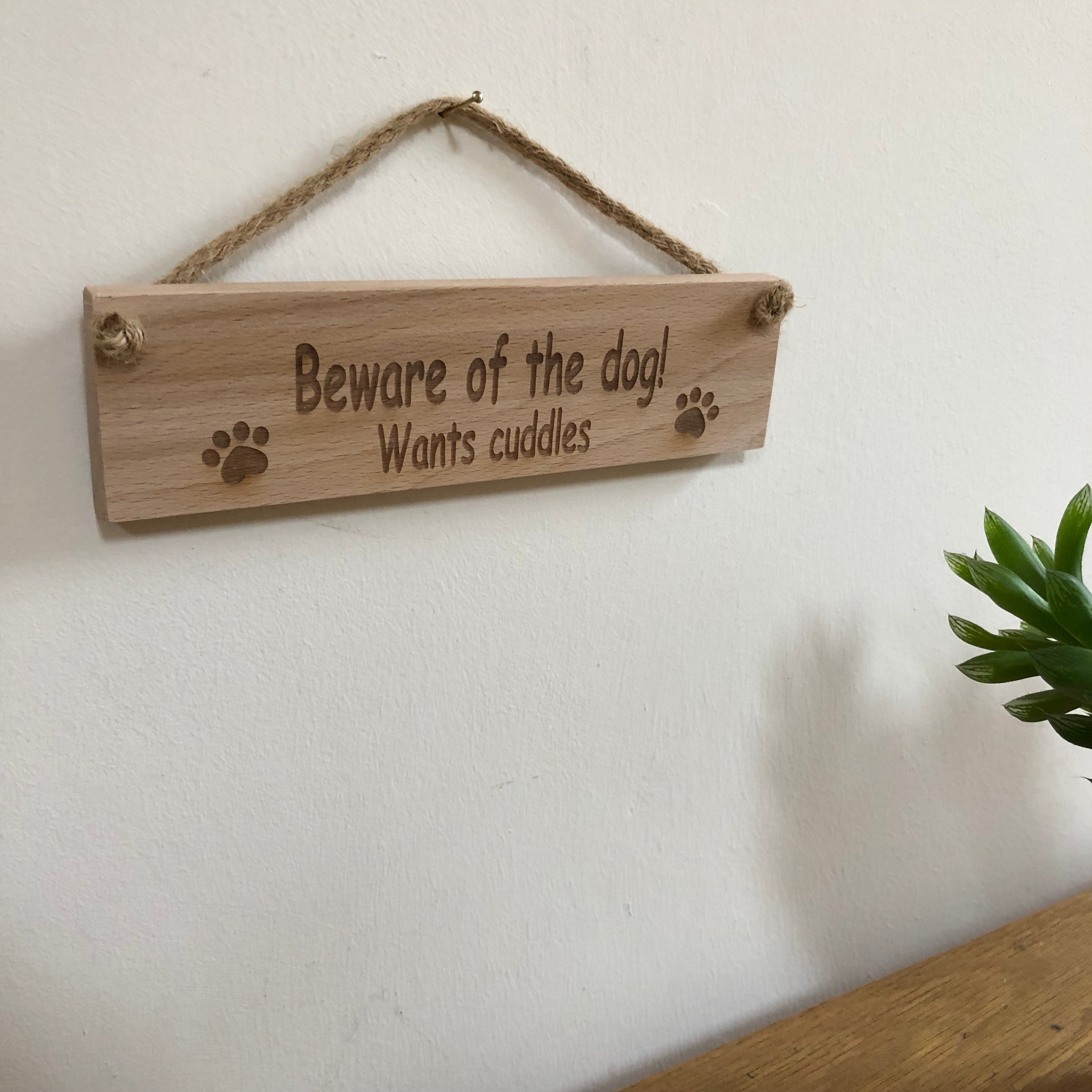 Wooden plaque - beware of the dog - wants cuddles