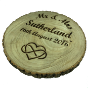 Personalised rustic wooden log slice platter with surname and choice of motif