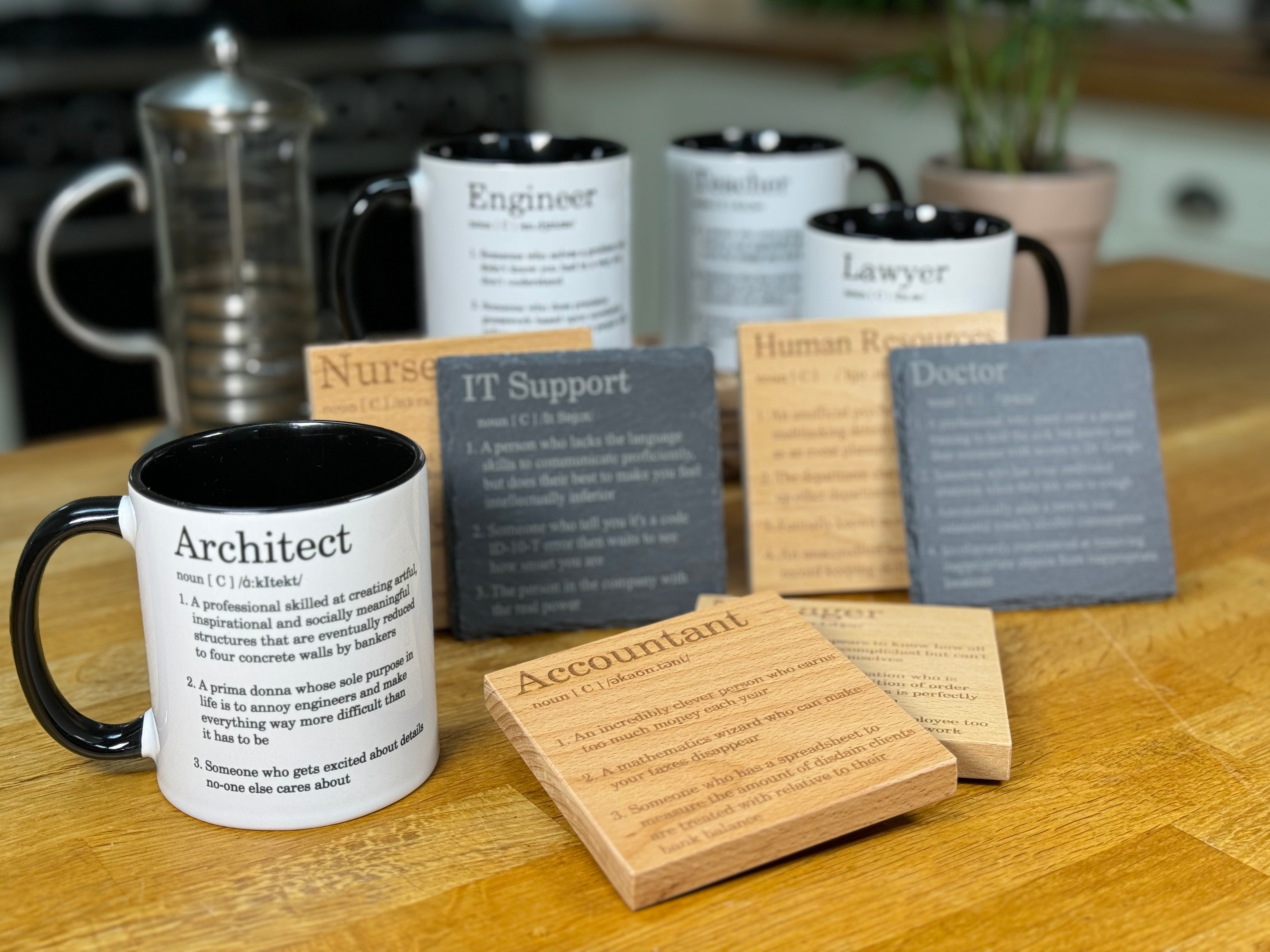 Coaster and mugs with humorous definitions of occupations