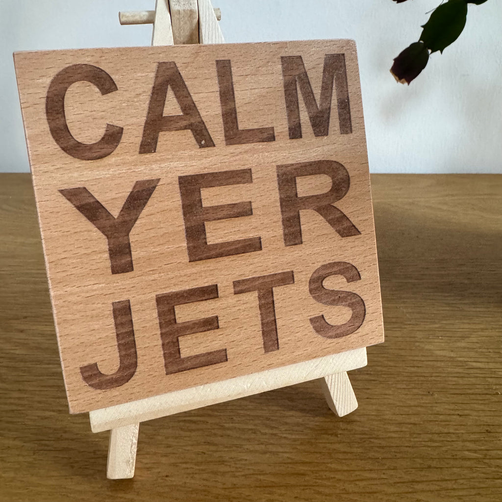 Wooden coaster gift - Scottish dialect - calm yer jets - displayed on an easel