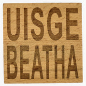 Wooden coaster gift - Scottish dialect - uisge beatha - varnished for protection