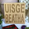 Wooden coaster gift - Scottish dialect - uisge beatha
