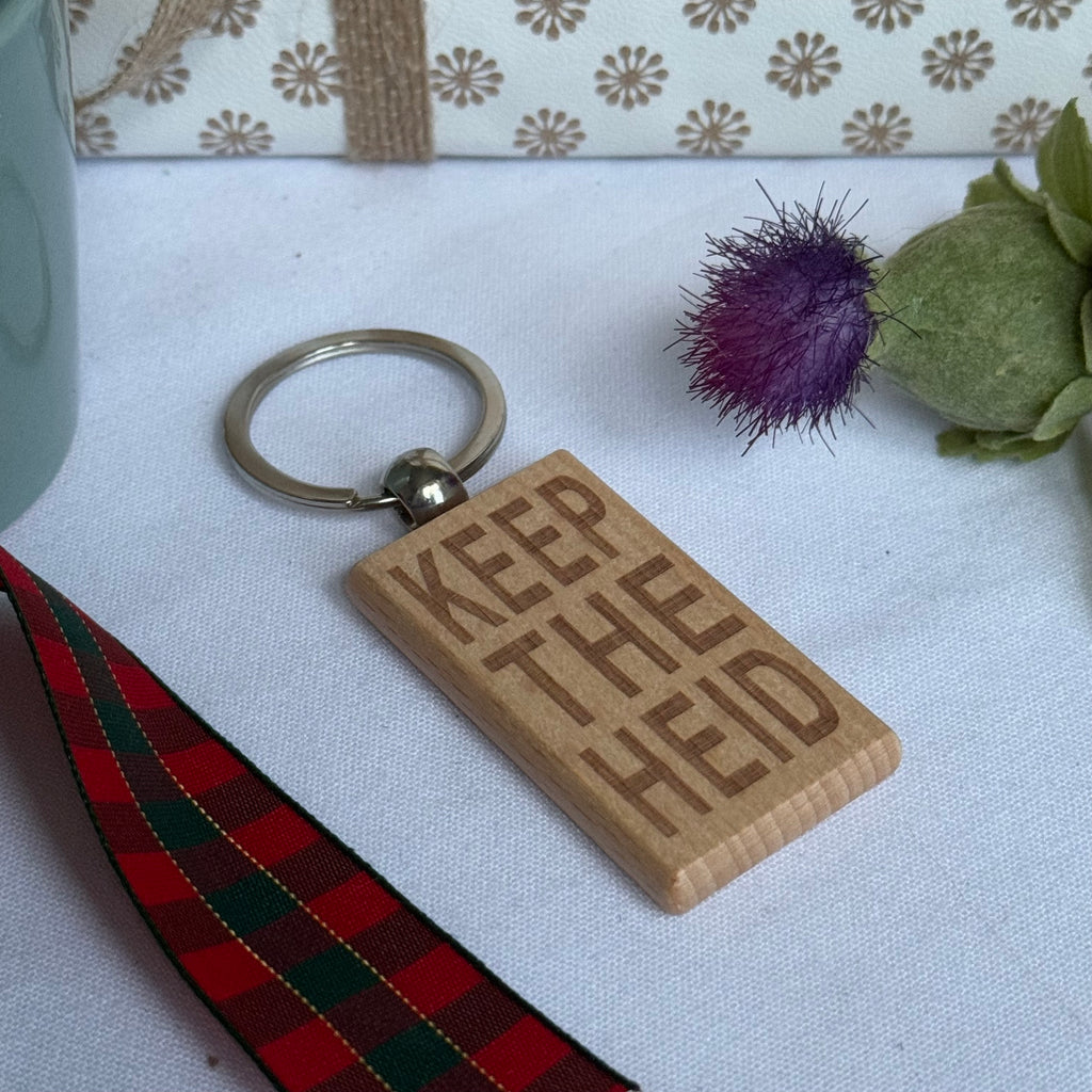 Wooden keyring laser engraved with Scottish dialect keep the heid