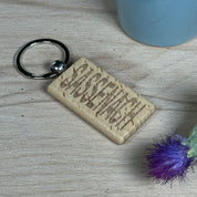 Wooden keyring laser engraved with Scottish dialect sassenach