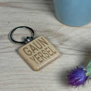 Wooden keyring laser engraved with Scottish dialect gaun yersel