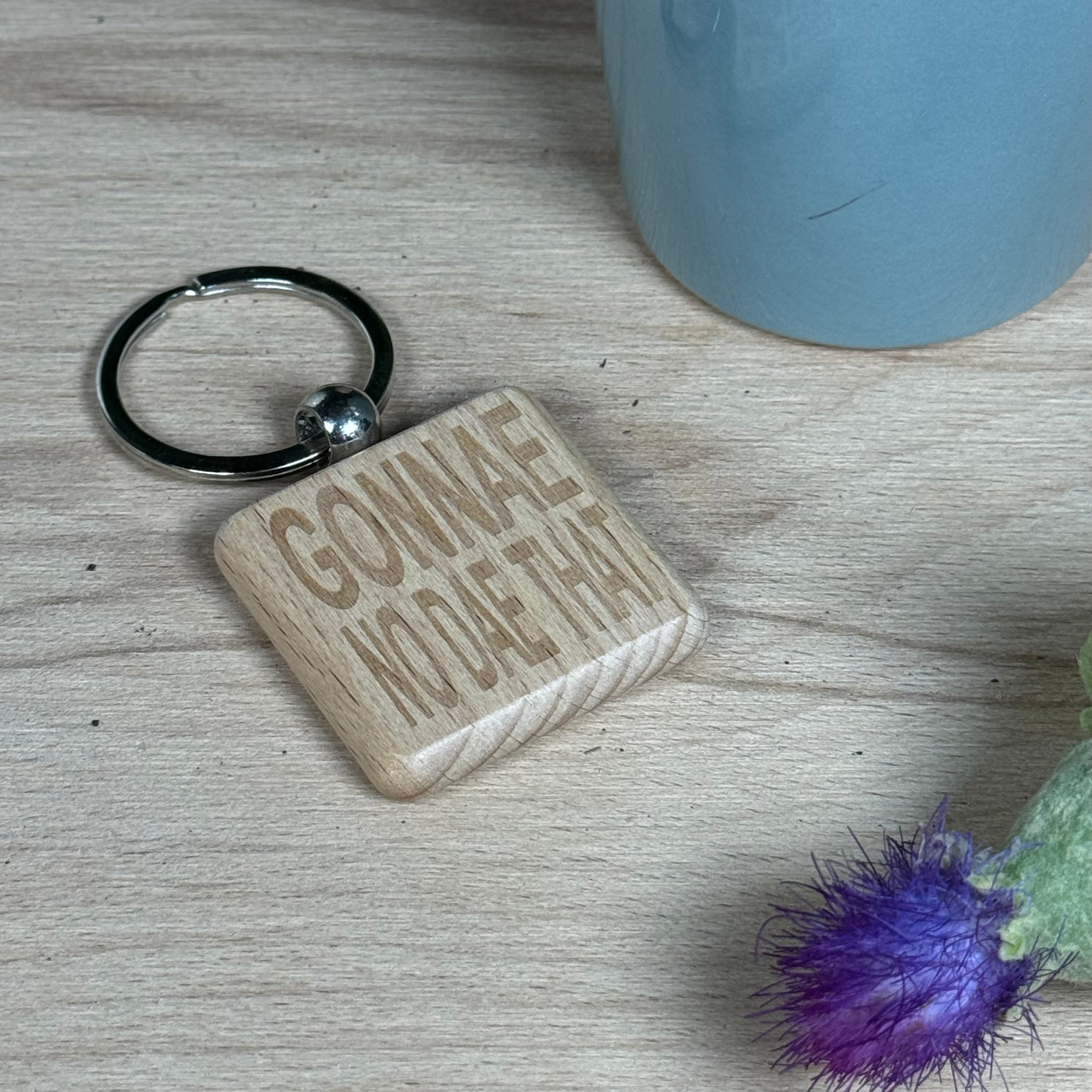 Wooden keyring laser engraved with Scottish dialect - gonnae no dae that