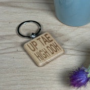 Wooden keyring laser engraved with Scottish dialect - up tae high doh