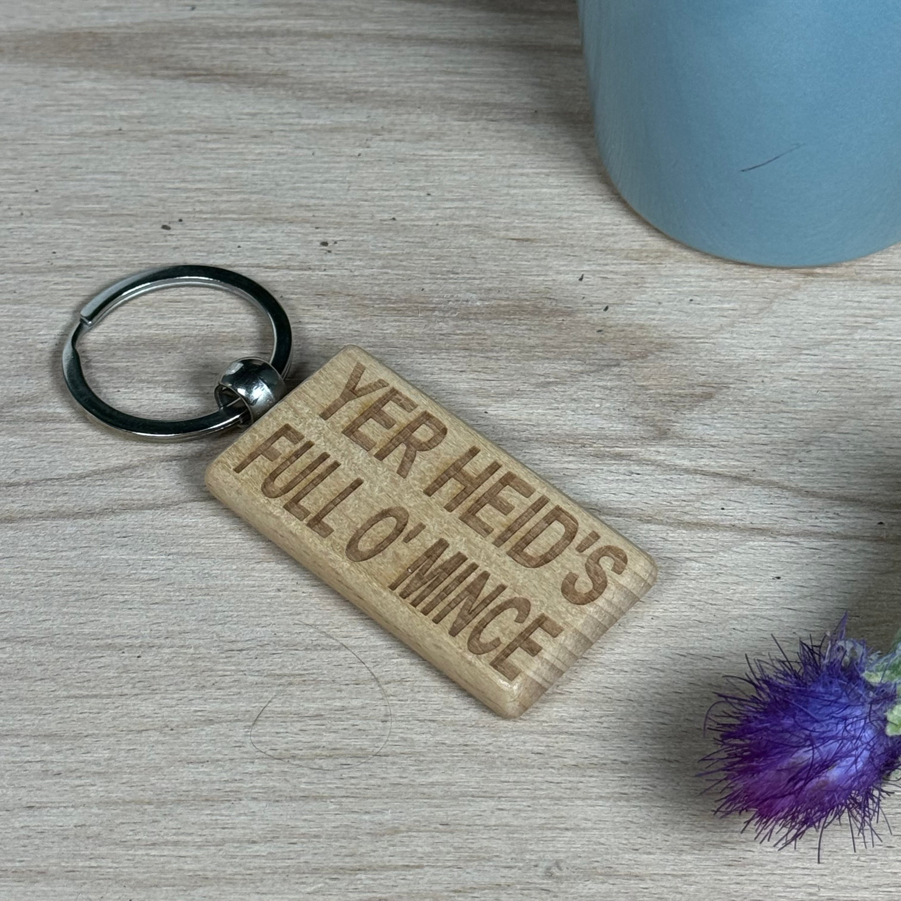 Wooden keyring laser engraved with Scottish dialect - yer heid's full o' mince