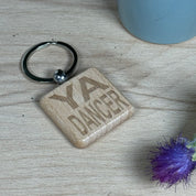 Wooden keyring laser engraved with Scottish dialect - ya dancer