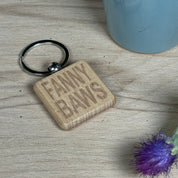 Wooden keyring laser engraved with Scottish dialect fannybaws