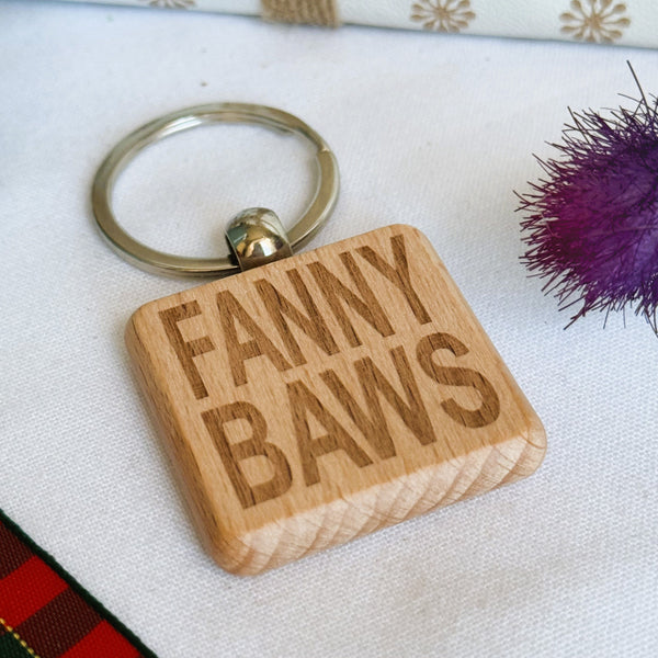Wooden keyring laser engraved with Scottish dialect fannybaws