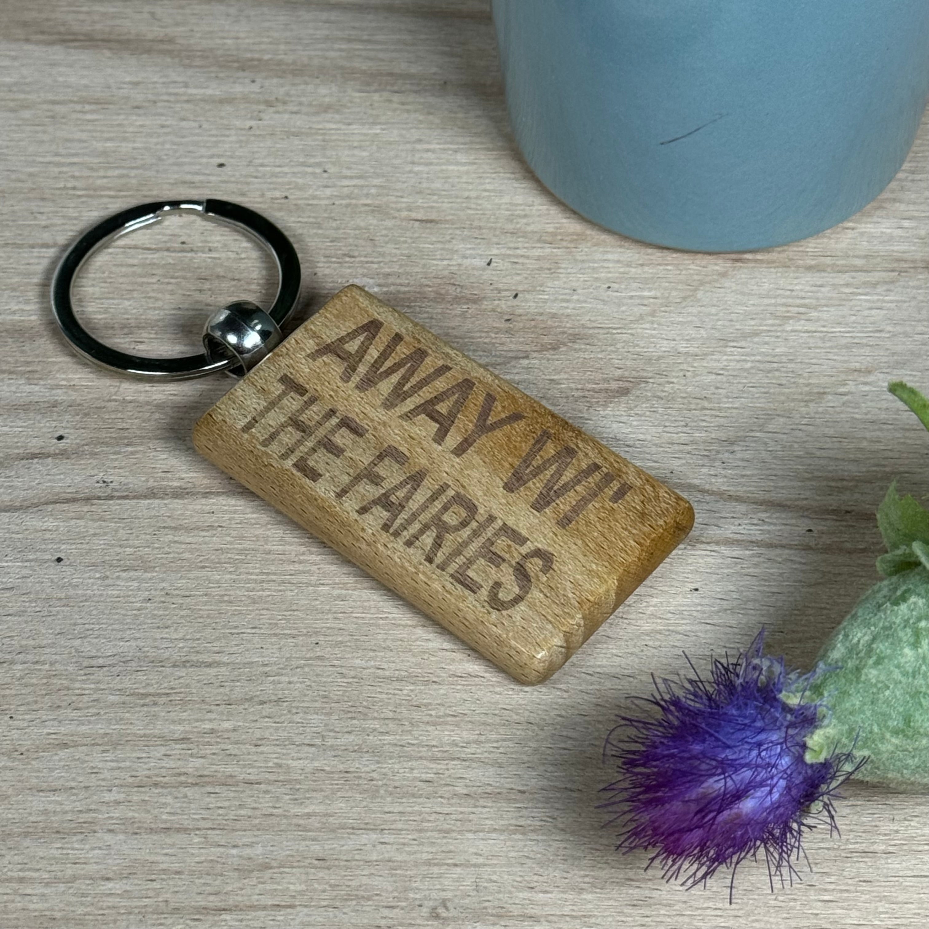 Wooden keyring laser engraved with Scottish dialect away wi the fairies