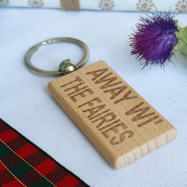 Wooden keyring laser engraved with Scottish dialect away wi the fairies