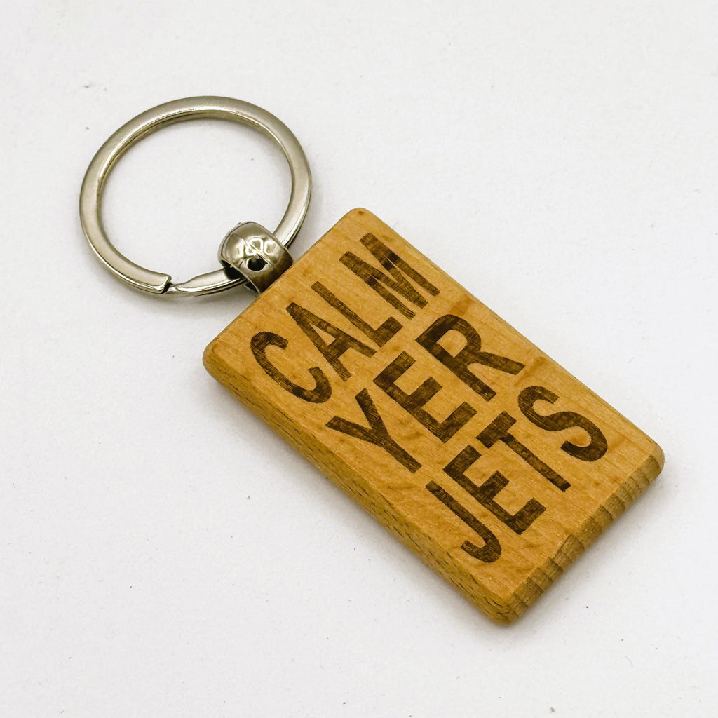 Wooden keyring laser engraved with Scottish dialect calm yer jets