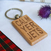 Wooden keyring laser engraved with Scottish dialect calm yer jets