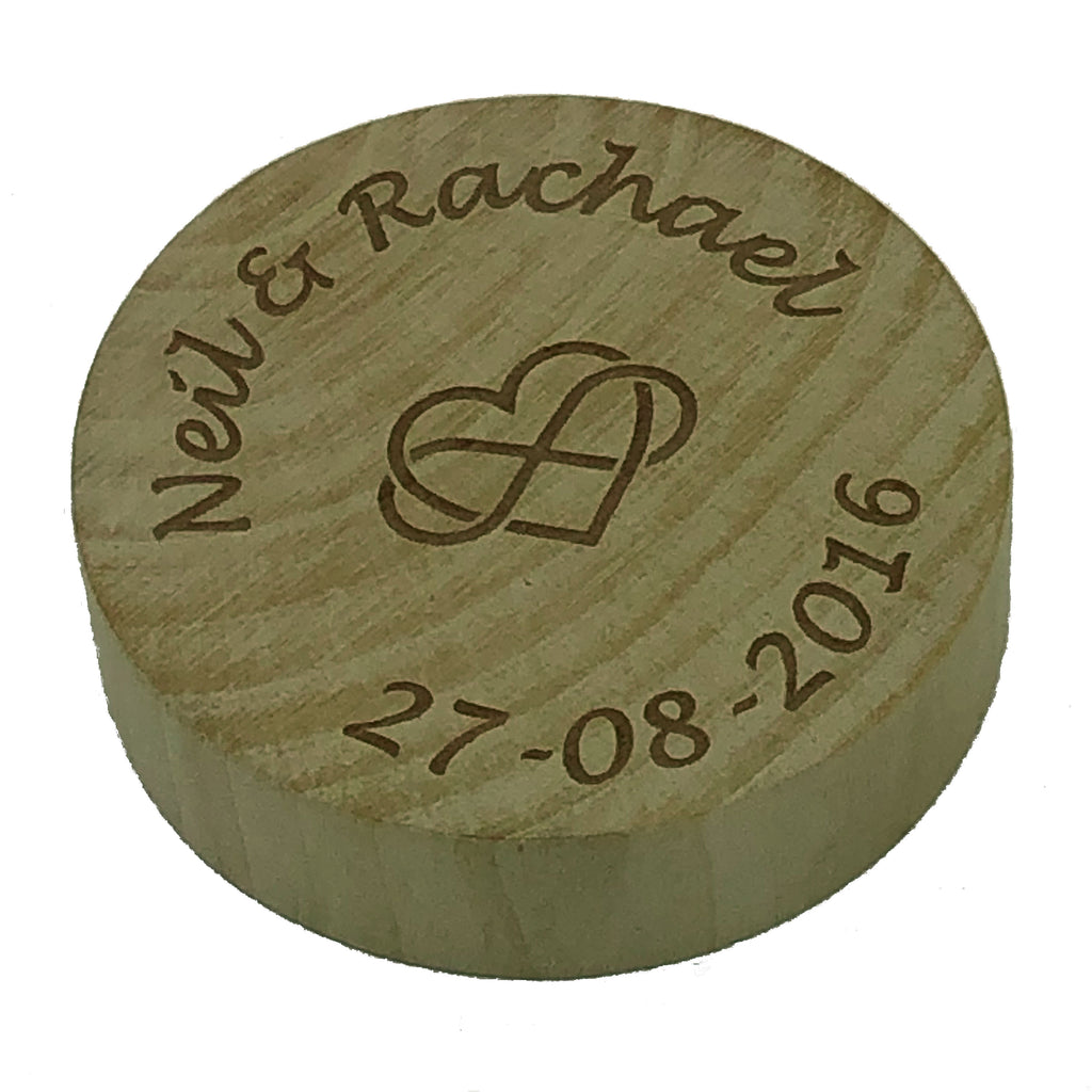 Wooden magnetic bottle openers, laser engraved with the couple's name and wedding date, plus a heart/infinity symbol