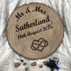 Personalised rustic wooden log slice platter with surname and choice of motif