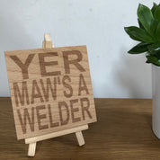 Wooden coaster gift for mothers - Scottish dialect - yer maw's a welder - displayed on an easel