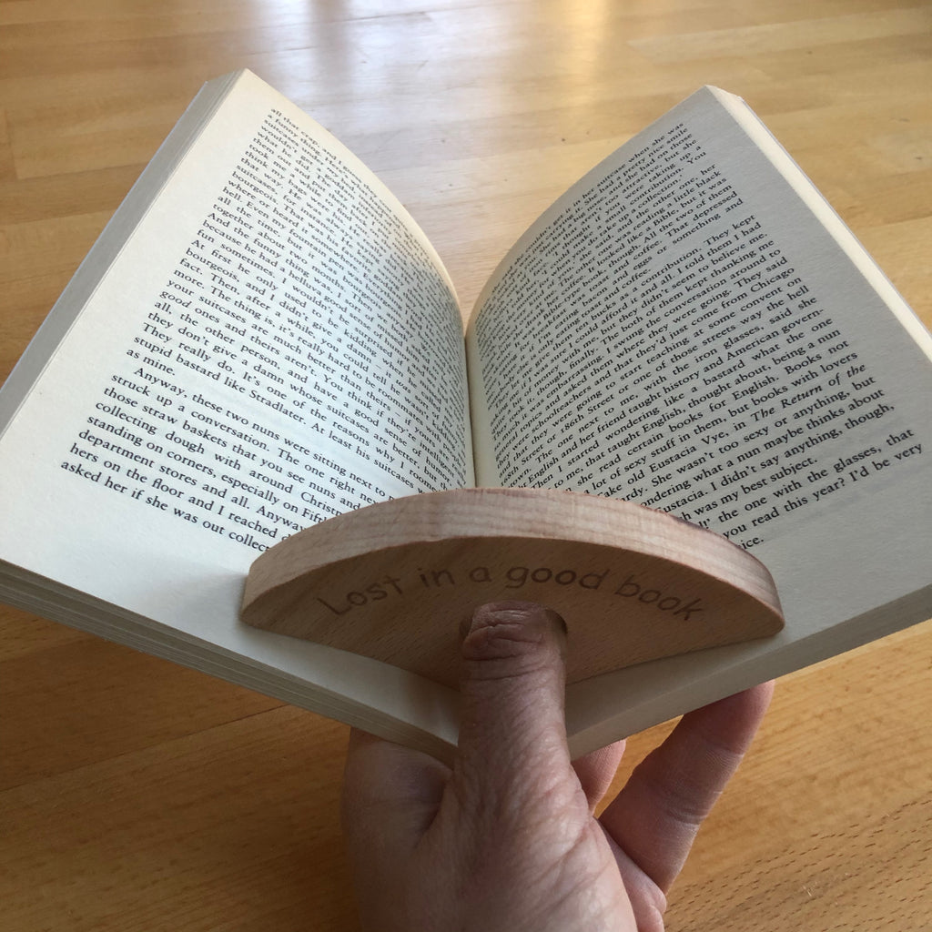 Wooden thumb book holder - plot twist