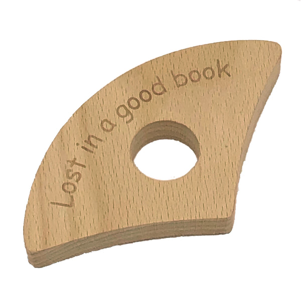 Wooden thumb book holder - lost in a good book