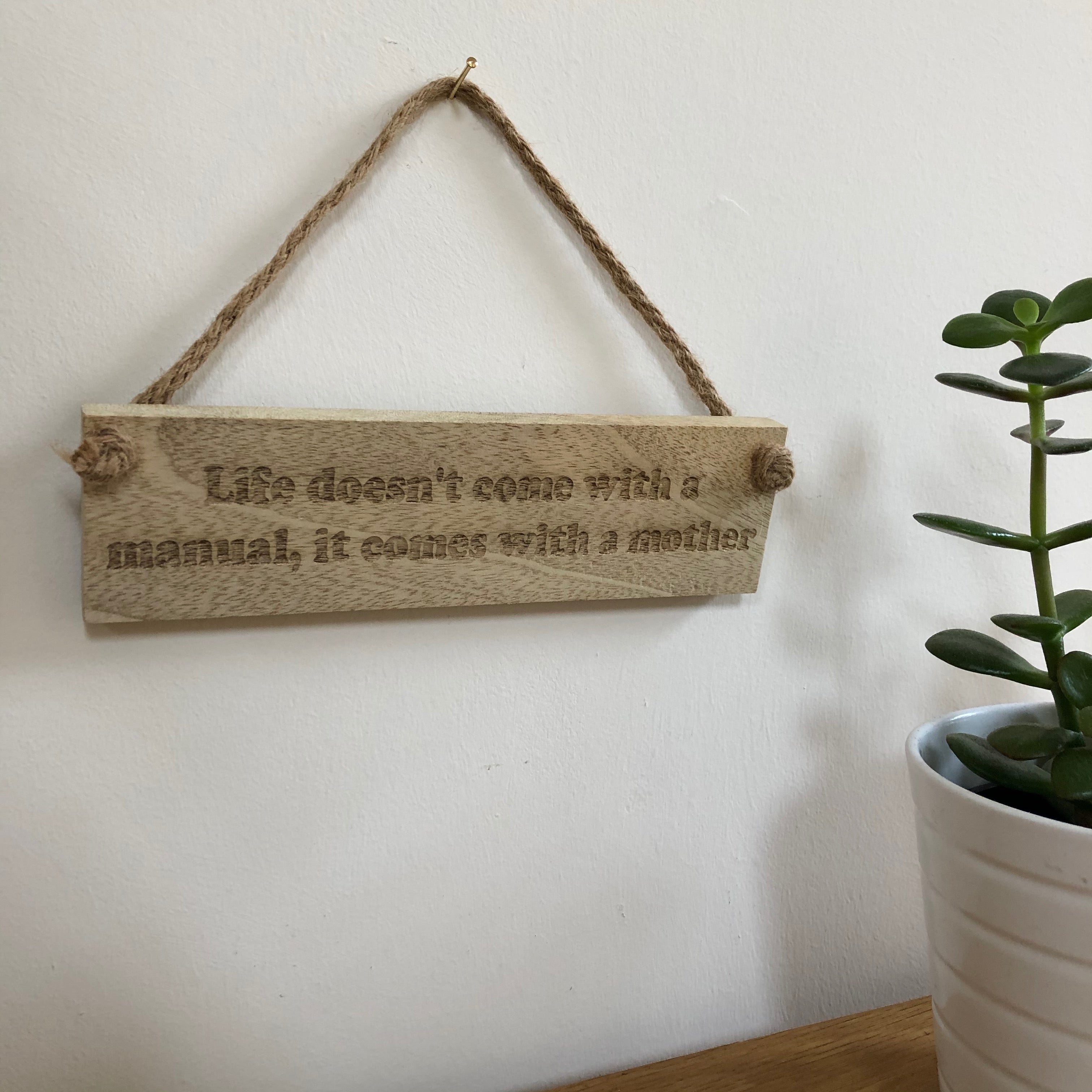 Wooden hanging plaque - life manual - hanging