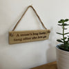Wooden hanging plaque - a mum's hug lasts long after she lets go - hanging