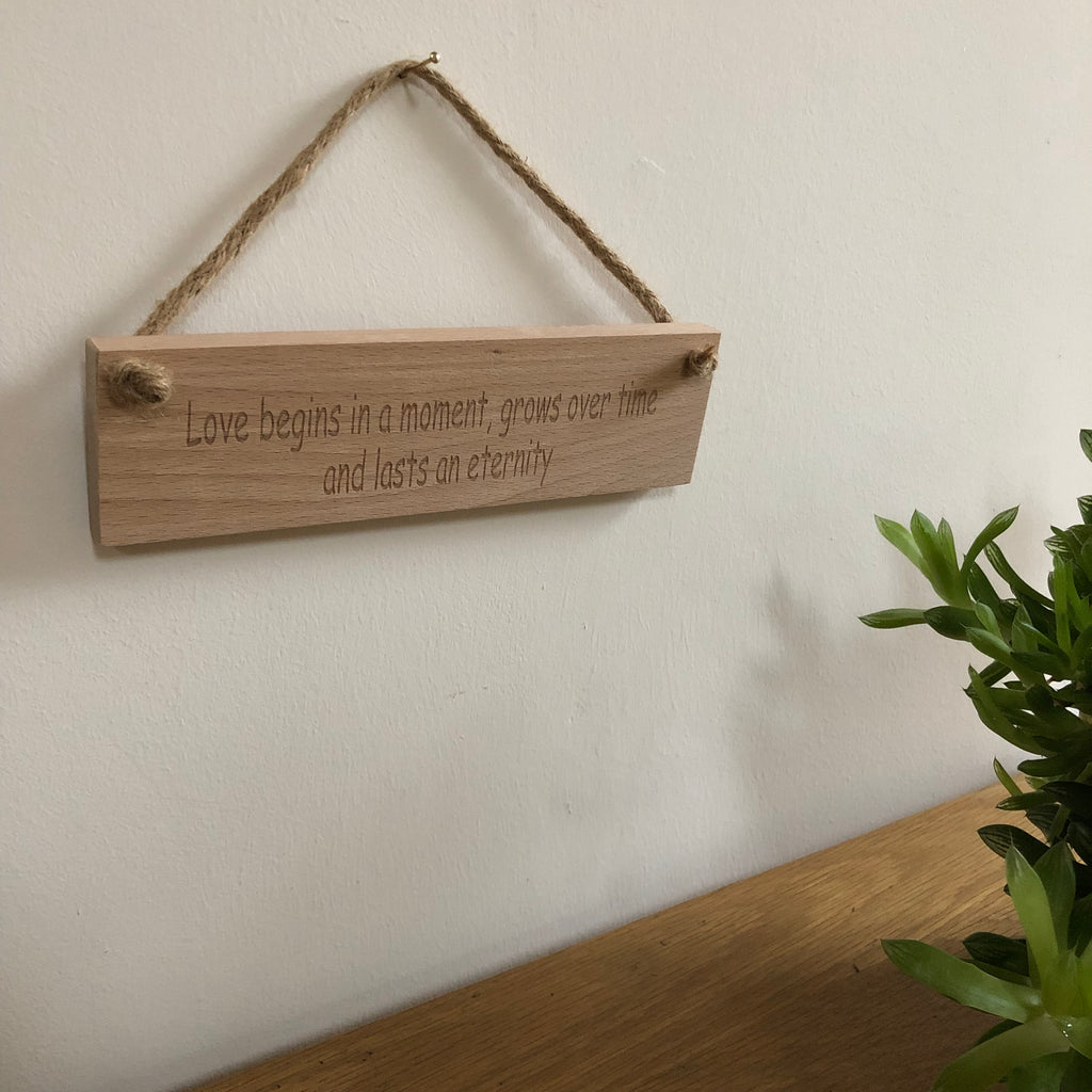 Wooden hanging plaque - valentines - Love starts in a moment